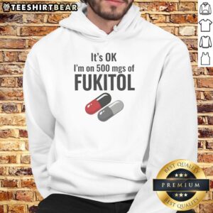 Funny hoodie featuring 'It's OK, I'm on 500 mg of Fukitol' design, perfect for humor lovers and casual wear.