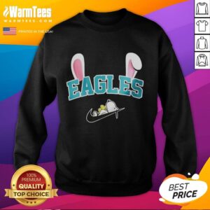 Official Philadelphia Eagles X Snoopy Happy Easter Sweatshirt featuring a festive design for Eagles fans.