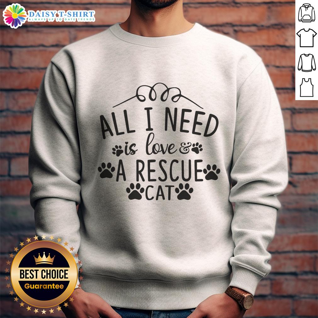 Official All I Need Is Love & A Rescue Cat Sweatshirt Alt Text: Official 'All I Need Is Love' Rescue Cat Sweatshirt featuring a cute cat graphic, perfect for cat lovers.