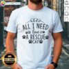 Alt Text: Official All I Need Is Love & A Rescue Cat T-Shirt featuring a cute cat graphic and stylish text design.