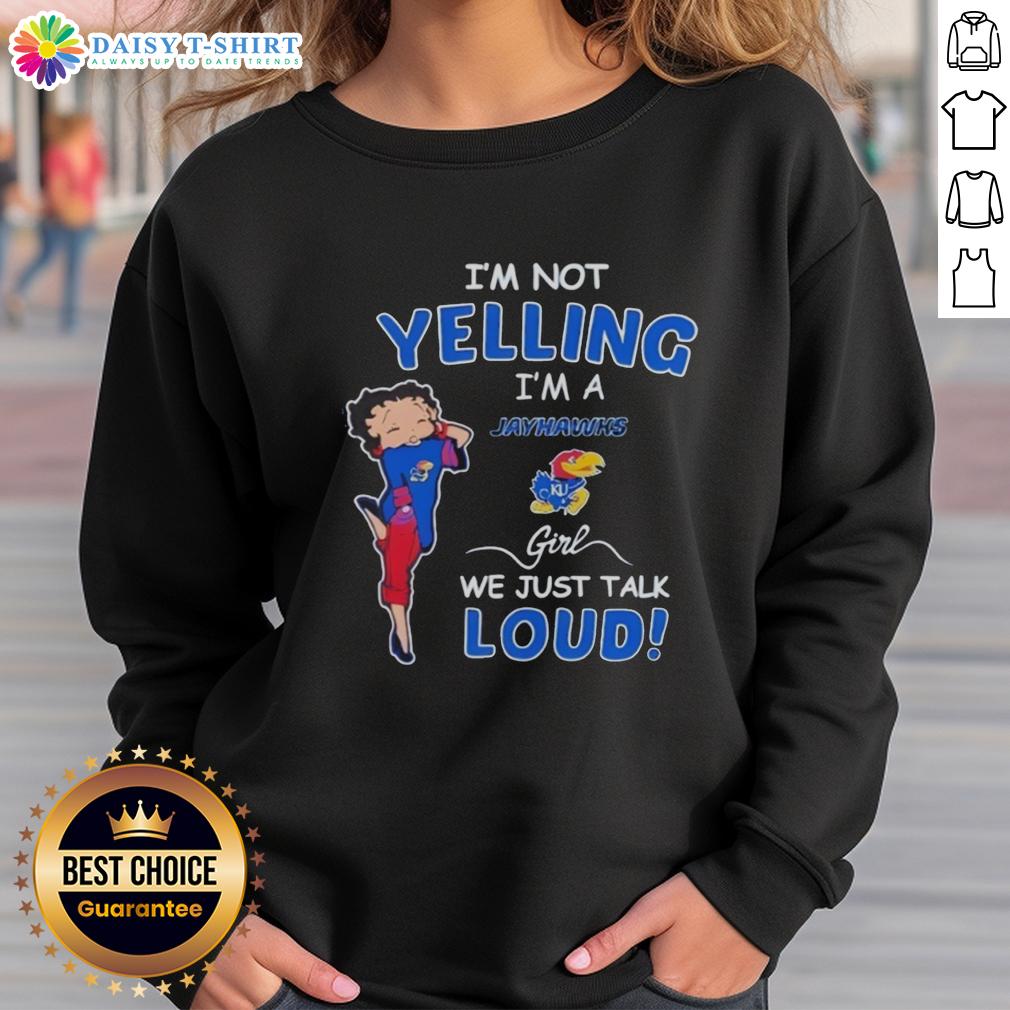 Official I'M Not Yelling I'M Kansas Jayhawks Girl We Just Talk Loud Sweatshirt Girl wearing an 'I'm Not Yelling, I'm Kansas Jayhawks' sweatshirt, showcasing team spirit and casual style.