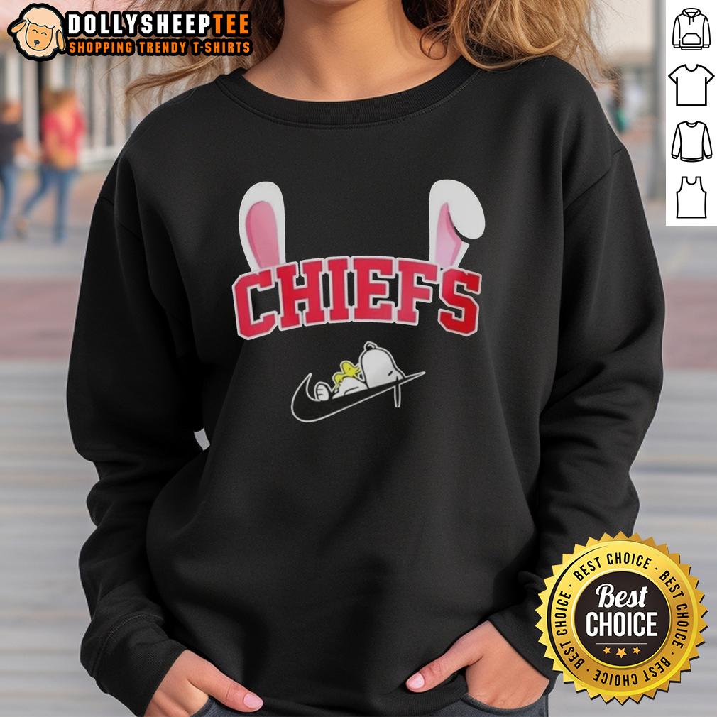 Official Kansas City Chiefs X Snoopy Happy Easter Sweatshirt Happy Easter sweatshirt featuring the Kansas City Chiefs and Snoopy, perfect for NFL fans celebrating the holiday.