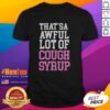 Alt Text: Official That's A Awful Lot Of Cough Syrup T-Shirt featuring a bold graphic design in vibrant colors on a black background.