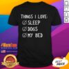 Official 'Things I Love: Sleep, Dogs, My Bed' T-Shirt design featuring playful graphics for dog lovers and sleep enthusiasts.