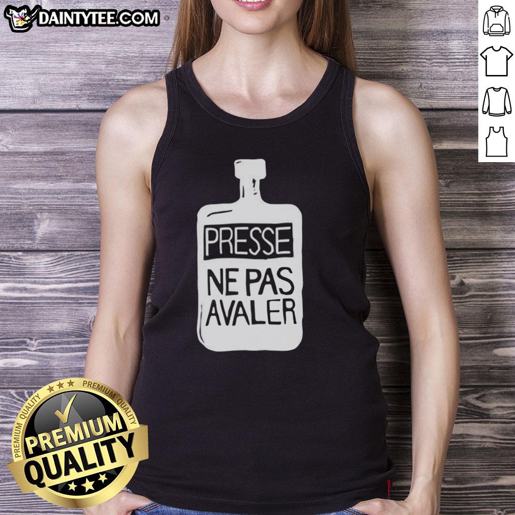 official-thom-yorke-wearing-presse-ne-pas-avaler-tank-top Alt Text: Thom Yorke wearing a Presse Ne Pas Avaler tank top, showcasing a casual yet stylish look at a public event.