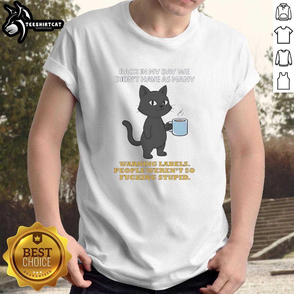 original-cat-back-in-my-day-we-didnt-have-as-many-warnning-labels-people-werent-so-fcking-stupid-t-shirt-1 Original Cat t-shirt featuring a humorous message about warning labels and common sense from the past.