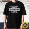 Alt Text: Vintage I'M Just Here To Watch New England Patriots Lose T-Shirt featuring bold lettering and classic design.