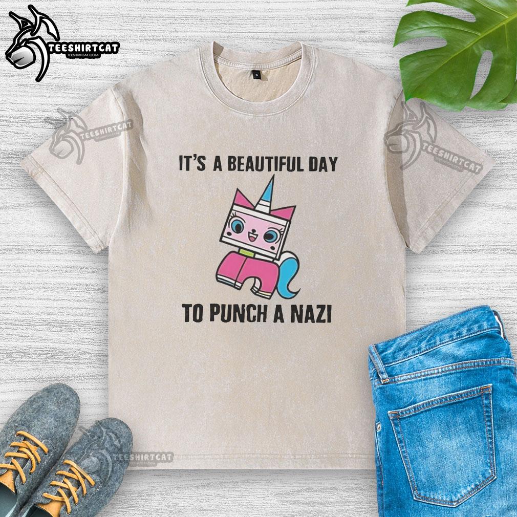 original-its-a-beautiful-day-to-punch-a-nazi-princess-unikitty-washed-t-shirt Original 'It's A Beautiful Day To Punch A Nazi' Unikitty washed t-shirt featuring vibrant colors and playful design.