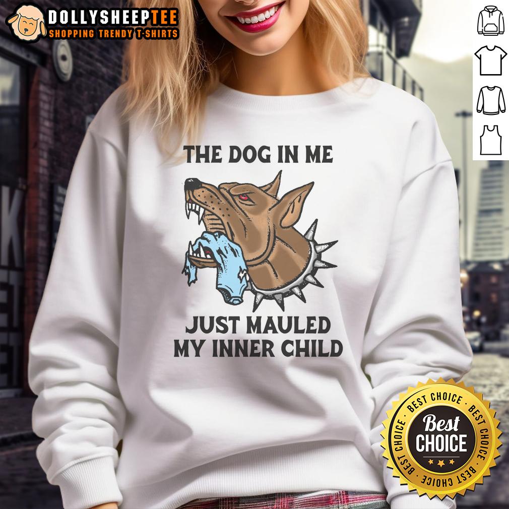 Original The Dog In Me Just Mauled My Inner Child Sweatshirt Alt Text: Cozy 'Original The Dog In Me Just Mauled My Inner Child' sweatshirt displayed on a wooden background, perfect for pet lovers.