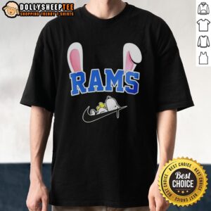 Official Los Angeles Rams X Snoopy Happy Easter T-Shirt featuring a festive design with Rams colors and Snoopy graphics.