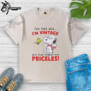 Official Peanuts Snoopy 'I'm Not Old, I'm Vintage' washed t-shirt featuring a playful Snoopy design, perfect for vintage lovers.