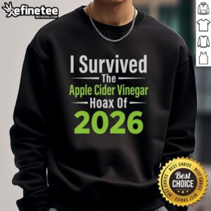 Alt Text: Pretty sweatshirt featuring the phrase 'I Survived The Apple Cider Vinegar Hoax Of 2026' in bold lettering.