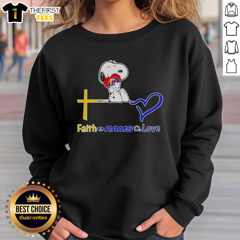 premium-los-angeles-rams-snoopy-hugs-heart-faith-rams-love-sweatshirt Premium Los Angeles Rams Snoopy hugs heart design on a cozy sweatshirt, perfect for Rams fans showcasing their love.