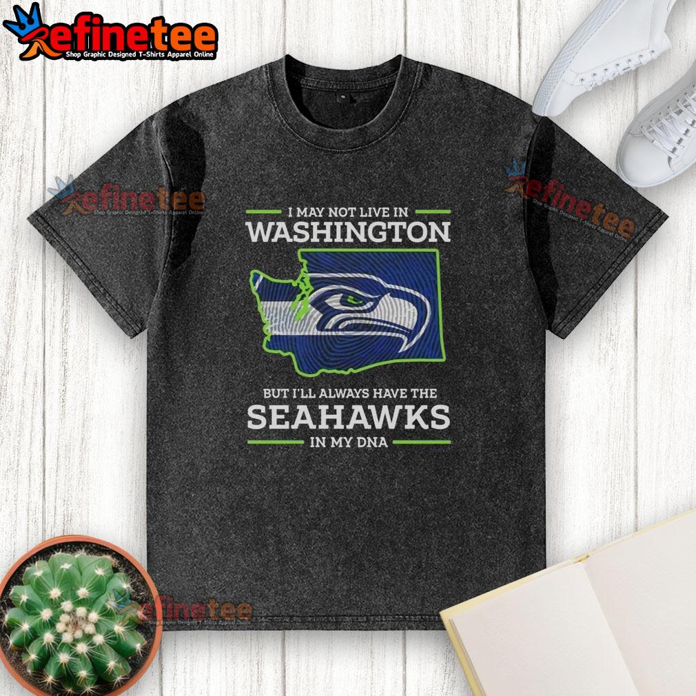 pretty-i-may-live-in-washington-but-ill-always-have-the-seattle-seahawks-in-my-dna-washed-t-shirt Washed Seattle Seahawks t-shirt showcasing team spirit for fans living in Washington and beyond.
