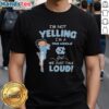 Alt Text: North Carolina Tar Heels girl t-shirt with 'I'm Not Yelling, We Just Talk Loud' slogan in vibrant colors.