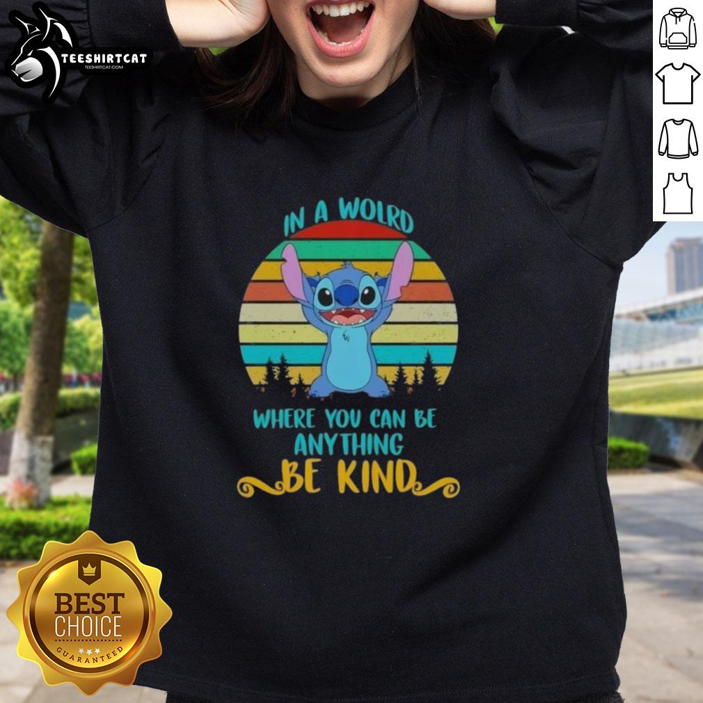 pretty-stitch-in-a-wolrd-where-you-can-anything-be-kind-retro-sweatshirt Retro sweatshirt featuring the phrase 'Be Kind' with a pretty stitch design, perfect for casual style.