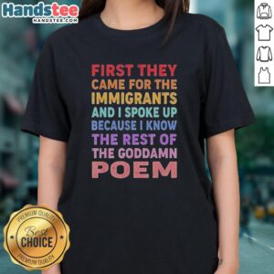 Colorful text on a ladies tee reads 'First They Came For The Immigrants And I Spoke Up' promoting social justice.