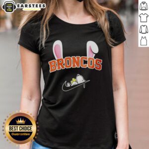 Denver Broncos X Snoopy Happy Easter ladies tee featuring vibrant graphics and a fun design for NFL fans celebrating Easter.