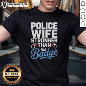 Alt Text: Official Police Wife Stronger Than The Badge Heart Cuffs T-Shirt design featuring a heart and handcuffs graphic.