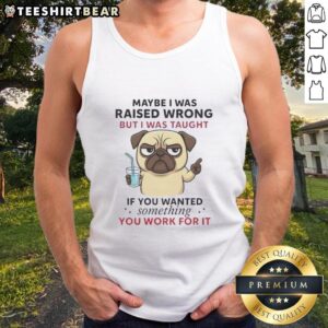 Pretty pug dog wearing a tank top with a motivational quote about hard work and determination.