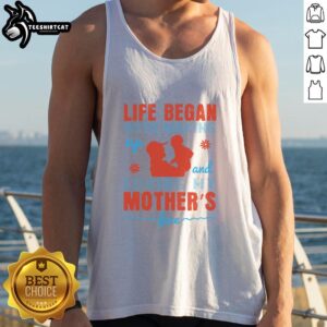 Woman wearing a 'Nice Life Began With Waking Up And Loving My Mother's Face' tank top, showcasing love and family.