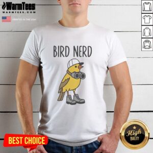 Top Brid nerd wearing shoes and binoculars t-shirt, showcasing a unique style and playful personality in a vibrant setting.