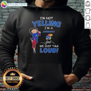 Alt Text: Kansas Jayhawks girl wearing I'm Not Yelling, We Just Talk Loud hoodie, showcasing team spirit and style.