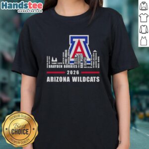Alt Text: Top 2026 Arizona Wildcats logo with city skyline design on a ladies tee, showcasing team spirit and style.