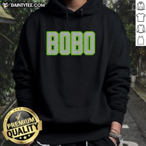 Alt Text: Custom neon green pattern hoodie featuring Seattle Seahawks logo, perfect for fans and stylish game day wear.