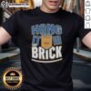 Alt Text: Top Hang It In The Brick Bobcat Collective Football National Champions 2025 T-Shirt design featuring team colors.