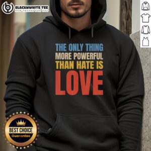 Alt Text: Vintage hoodie featuring The Only Thing More Powerful Than Hate Is Love design, showcasing a positive message.