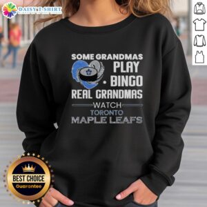 Alt Text: Cozy sweatshirt reading Some Grandmas Play Bingo, Real Grandmas Watch Toronto Maple Leafs for hockey fans.