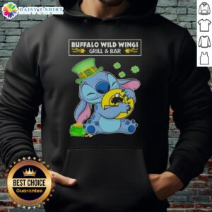 Alt Text: Cute Stitch hugging Buffalo Wild Wings Grill and Bar logo on a Happy St. Patrick's Day hoodie.