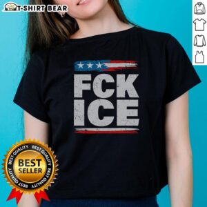 Distressed American flag design on Top Fck Ice Anti Ice ladies tee, perfect for casual wear and patriotic style.