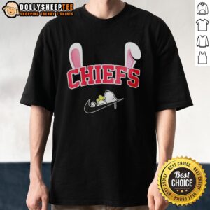 Official Kansas City Chiefs X Snoopy Happy Easter T-Shirt featuring colorful graphics of Snoopy and team logo.