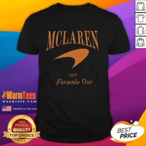 Alt Text: Good Vintage Style F1 McLaren Racing T-Shirt featuring retro design and iconic logo in vibrant colors.