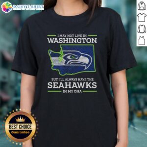 Seattle Seahawks ladies tee featuring 'Hot I May Live In Washington But I'll Always Have The Seahawks In My DNA' design.