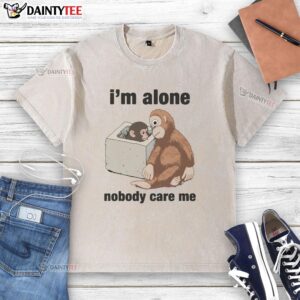 Alt Text: Cute I'm Alone Nobody Cares Me Punch The Monkey washed t-shirt featuring a playful monkey design in vibrant colors.