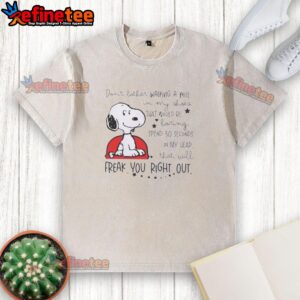 Alt Text: Snoopy walking in my shoes on a washed t-shirt, capturing the quirky phrase about thoughts and imagination.