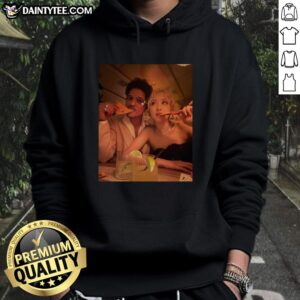 Bruno Mars enjoying pizza in a stylish hoodie at the 2026 Grammy Awards, radiating good vibes and fun.