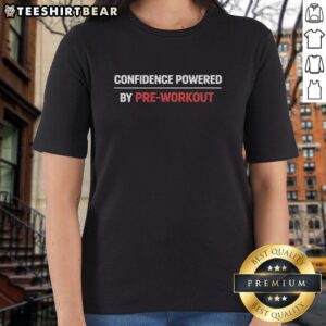 Alt Text: Confident woman wearing a 'Good Confident Powered By Pre-Workout' tee, showcasing fitness enthusiasm and style.