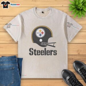 Alt Text: Awesome Pittsburgh Steelers football logo on a big helmet graphic featured on a washed t-shirt design.
