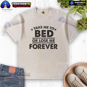 Stylish 'Nice Take Me Tox Bed or Lose Me Forever' washed t-shirt displayed on a hanger in a bright room.