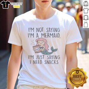 Alt Text: Top I'm Not Saying I'm A Mermaid I'm Just Saying I Need Snacks T-Shirt design featuring playful mermaid graphics.