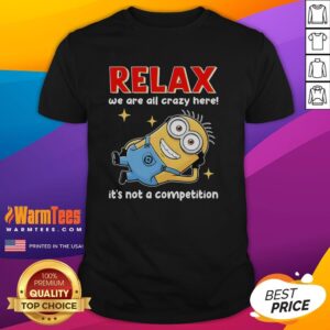 Alt Text: Good Minion lying relaxed on a t-shirt with the phrase We Are All Crazy Here! It's Not A Competition.