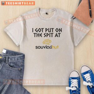 Good I Got Put On The Spit At Souvlakihut washed t-shirt displayed on a rustic wooden background.