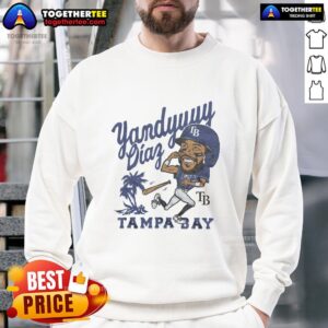 Yandy Diaz wearing a stylish Tampa Bay Rays sweatshirt at a game, showcasing team spirit and baseball fashion.