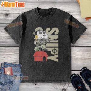 Alt Text: Original Snoopy sniper and Woodstock sitting on a doghouse design on a washed t-shirt, perfect for fans of Peanuts.