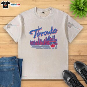 Premium Toronto Blue Jays city skyline homage washed t-shirt featuring a vibrant design celebrating the team and Toronto.