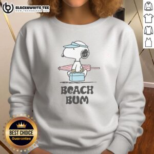 Alt Text: Cozy Pretty Peanuts Beach Bum Snoopy Sweatshirt featuring Snoopy relaxing on the beach, perfect for casual wear.